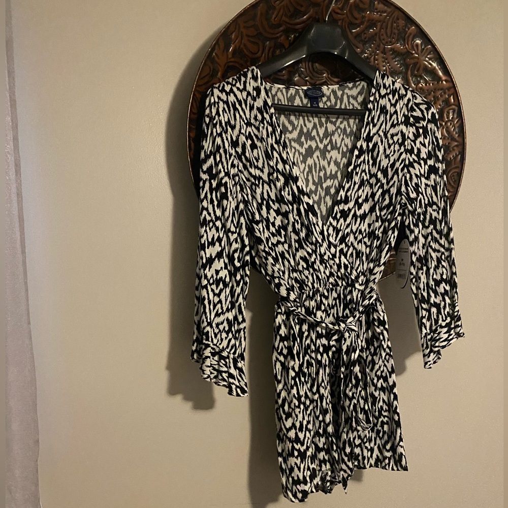 Scoop ruffle tie romper.  NWT